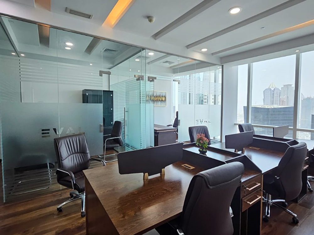 Vacant office space with glass partitions and Burj Khalifa views in Park Lane Tower, Business Bay
