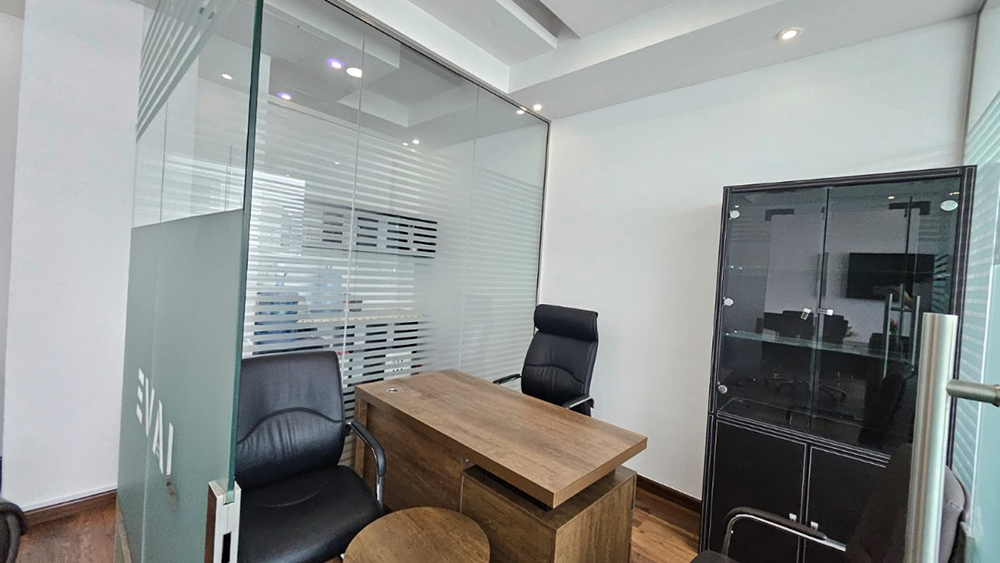 Vacant office space with glass partitions and Burj Khalifa views in Park Lane Tower, Business Bay