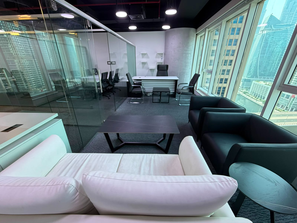 Fully furnished office space with glass partitions and canal views in Churchill Executive Tower
