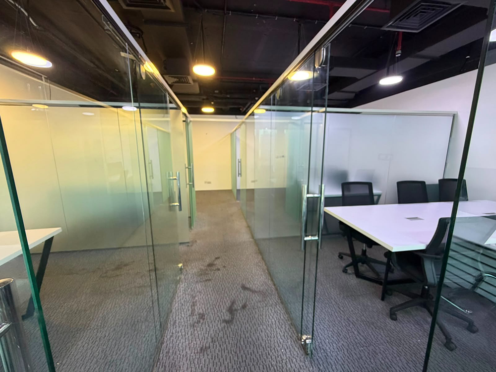 Fully furnished office space with glass partitions and canal views in Churchill Executive Tower