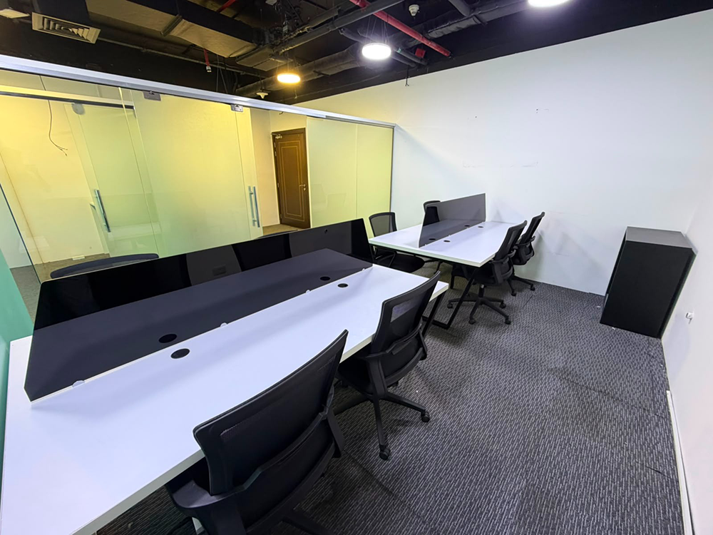 Fully furnished office space with glass partitions and canal views in Churchill Executive Tower