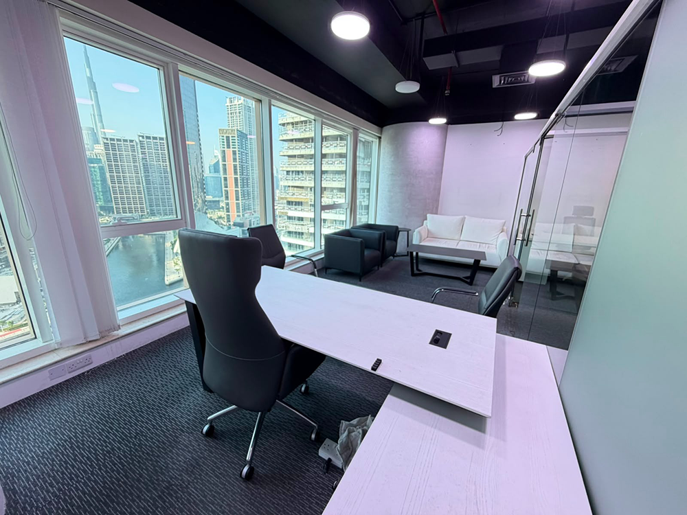 Fully furnished office space with glass partitions and canal views in Churchill Executive Tower