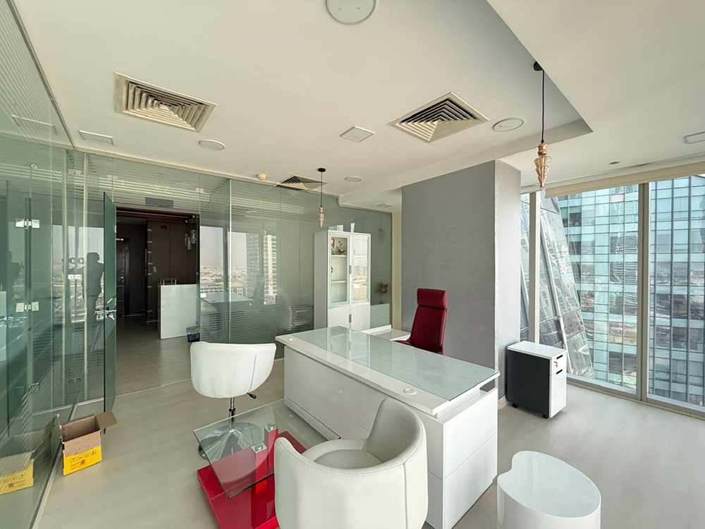 Fully furnished office space with glass partitions for rent in The Prism, Business Bay