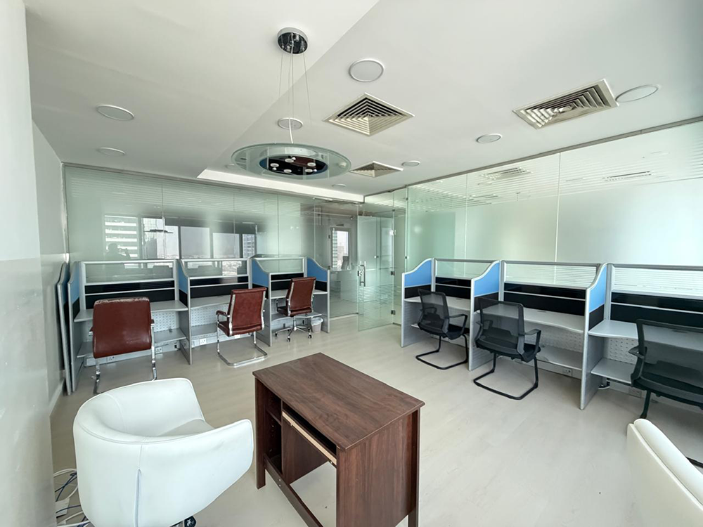 Fully furnished office space with glass partitions for rent in The Prism, Business Bay