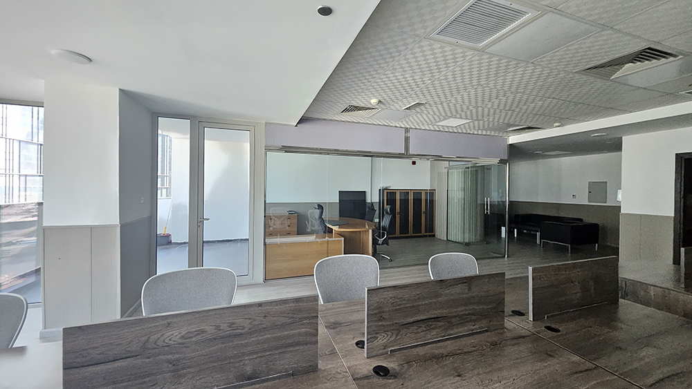 Fully furnished office space with glass partitions for rent in The Prism, Business Bay