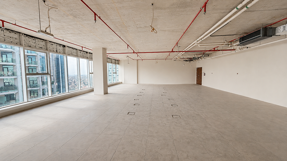 Open-layout shell and core office space for rent in Al Manara Tower, Business Bay